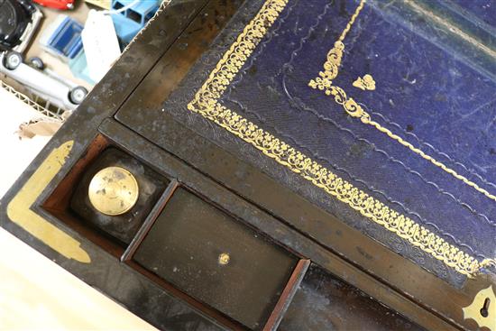 A Victorian brass bound walnut and mahogany writing slope